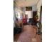 Charming sunroom with brick flooring and various seating arrangements at 930 E Page St, Gilbert, AZ 85234