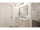 Bright bathroom with a single sink vanity and black hardware at 9602 N 5Th Ave, Phoenix, AZ 85021