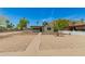 Charming single-story home with desert landscaping and a bright blue sky at 9602 N 5Th Ave, Phoenix, AZ 85021