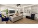 Bright living room featuring wood floors, modern furnishings, and an open floor plan at 9602 N 5Th Ave, Phoenix, AZ 85021