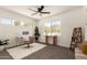 Bright home office with a modern desk, plants, and natural lighting at 9602 N 5Th Ave, Phoenix, AZ 85021