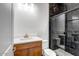 Elegant bathroom featuring a marble tiled shower and natural wood vanity at 9705 E Sector Dr, Mesa, AZ 85212