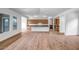 Spacious living area featuring an open floorplan with hardwood floors and recessed lighting at 9705 E Sector Dr, Mesa, AZ 85212