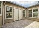 A private courtyard featuring neutral stone pavers and framed by the home's exterior at 9705 E Sector Dr, Mesa, AZ 85212