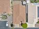 Aerial view of a residential property featuring a well-maintained roof and a landscaped backyard at 11550 W Mule Deer Ct, Surprise, AZ 85378