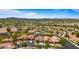 Scenic aerial perspective of a neighborhood nestled among lush trees, offering beautiful desert mountain views at 13614 N 12Th Way, Phoenix, AZ 85022
