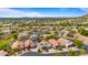 Scenic aerial shot of a vibrant community with stunning mountain views and lush greenery at 13614 N 12Th Way, Phoenix, AZ 85022