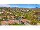 Picturesque aerial view of a well-planned community nestled in the desert, showcasing beautiful tile roofs at 13614 N 12Th Way, Phoenix, AZ 85022