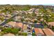 Overhead view of a residential neighborhood with mature landscaping, pools and well-maintained streets at 13614 N 12Th Way, Phoenix, AZ 85022
