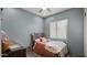 Serene bedroom with soft lighting, comfortable bed, and minimalist decor, providing a peaceful sanctuary at 13614 N 12Th Way, Phoenix, AZ 85022