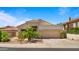 Inviting single-story home with desert landscaping and a convenient attached two-car garage at 13614 N 12Th Way, Phoenix, AZ 85022