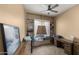 Bright office with built-in shelving, desk space, and natural light, creating an ideal work-from-home environment at 13614 N 12Th Way, Phoenix, AZ 85022