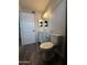 Bathroom featuring a toilet, sink with white cabinet and vanity lights at 1404 S Spencer --, Mesa, AZ 85204