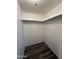 This closet features hardwood floors and shelves at 1404 S Spencer --, Mesa, AZ 85204