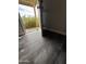 View of installed wood look floors and open front door at 1404 S Spencer --, Mesa, AZ 85204