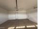 This spacious garage features a functional door and an automatic opener for added convenience and ease of use at 1404 S Spencer --, Mesa, AZ 85204