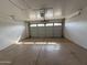 This spacious garage features a functional door and an automatic opener for added convenience and ease of use at 1404 S Spencer --, Mesa, AZ 85204