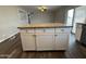 Kitchen featuring a spacious center island with granite countertops and ample storage at 1404 S Spencer --, Mesa, AZ 85204