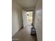 Image features a utility space with an open door leading to the back yard at 1404 S Spencer --, Mesa, AZ 85204