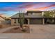 Charming single-Gathering home with a well-manicured front yard and a two-car garage at 1411 W Mendoza Ave, Mesa, AZ 85202