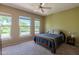 A bright bedroom featuring 3 large windows providing natural light at 14250 W Wigwam Blvd # 121, Litchfield Park, AZ 85340