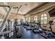 Well-equipped fitness center with modern exercise equipment and natural light at 14250 W Wigwam Blvd # 121, Litchfield Park, AZ 85340
