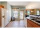Bright kitchen offers plenty of counter space, a door to the outside and modern appliances at 14250 W Wigwam Blvd # 121, Litchfield Park, AZ 85340