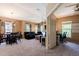 Open-concept living and dining area with updated finishes and lots of space at 14250 W Wigwam Blvd # 121, Litchfield Park, AZ 85340