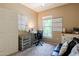 A dedicated office space features a comfortable desk setup, ensuring a productive and organized workspace at 14250 W Wigwam Blvd # 121, Litchfield Park, AZ 85340