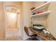 Cozy office nook with storage shelves is the perfect place to work from home at 14250 W Wigwam Blvd # 121, Litchfield Park, AZ 85340