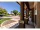 Covered walkway shows well-kept common area and sidewalks at 14250 W Wigwam Blvd # 121, Litchfield Park, AZ 85340