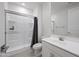 Clean bathroom featuring a shower, and vanity with a large mirror at 14413 W Eugene Ter, Surprise, AZ 85379
