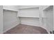 Walk-in closet provides ample storage with multiple shelves and clothing racks at 14413 W Eugene Ter, Surprise, AZ 85379