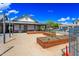 Charming community building with garden plots, offering residents a space to grow their own plants at 14413 W Eugene Ter, Surprise, AZ 85379