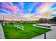 Community park with green space, walking path, and white fencing, perfect for outdoor enjoyment at 14413 W Eugene Ter, Surprise, AZ 85379