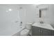 Bathroom with tub shower, modern sink and vanity, and neutral wall color at 1450 E Topeka Dr, Phoenix, AZ 85024
