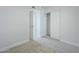 Bedroom features neutral carpet, with white trim and closet at 1450 E Topeka Dr, Phoenix, AZ 85024