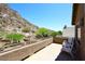 Relaxing back patio featuring a mountain view and outdoor seating area at 14833 S 14Th Pl, Phoenix, AZ 85048