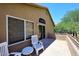 Charming balcony showcasing outdoor seating with views of the surrounding landscape at 14833 S 14Th Pl, Phoenix, AZ 85048