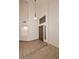 A bright entryway with high ceilings, tile floors, and a view of the front door at 14833 S 14Th Pl, Phoenix, AZ 85048