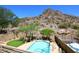 Inviting pool area with mountain views, well-manicured landscaping, and an inground swimming pool, perfect for relaxation at 14833 S 14Th Pl, Phoenix, AZ 85048