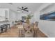 Eat-in dining area featuring modern ceiling fan and natural light at 1511 E Harmony Ave, Mesa, AZ 85204