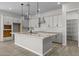 Modern kitchen with granite countertops, stainless steel appliances, and ample cabinet space at 15620 W Georgia Dr, Surprise, AZ 85379