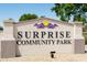 Prominent 'Surprise Community Park' sign indicating a public recreational space for residents at 15695 W Christy Dr, Surprise, AZ 85379