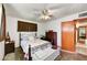 Bedroom with a queen bed, ceiling fan, and cozy decor at 1941 E Hazelwood St, Phoenix, AZ 85016