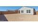 Large backyard offers space for Gathering activities or a future garden at 23419 W Albeniz Pl, Buckeye, AZ 85326