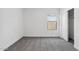 Clean bedroom with a closet, window, neutral carpet and white walls offering a blank canvas to personalize at 23419 W Albeniz Pl, Buckeye, AZ 85326