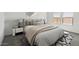 Nicely decorated main bedroom with a large window and natural light at 23419 W Albeniz Pl, Buckeye, AZ 85326
