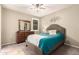 Inviting bedroom showcasing a ceiling fan and lots of natural light at 2440 W Arroyo Way, San Tan Valley, AZ 85144