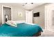 Cozy bedroom with a ceiling fan, wainscotting and an ensuite bathroom at 2440 W Arroyo Way, San Tan Valley, AZ 85144